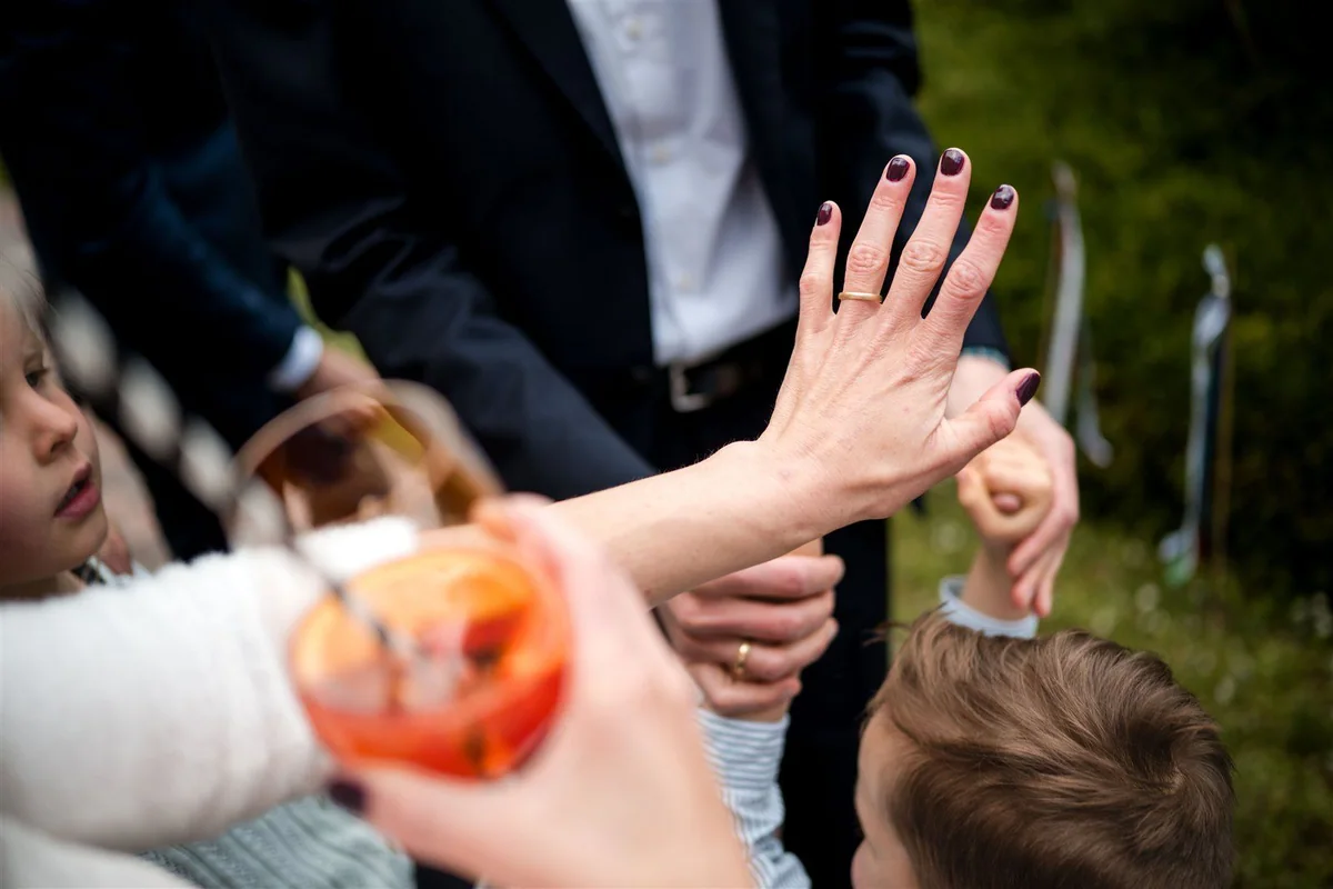Hands touch during congratulations.