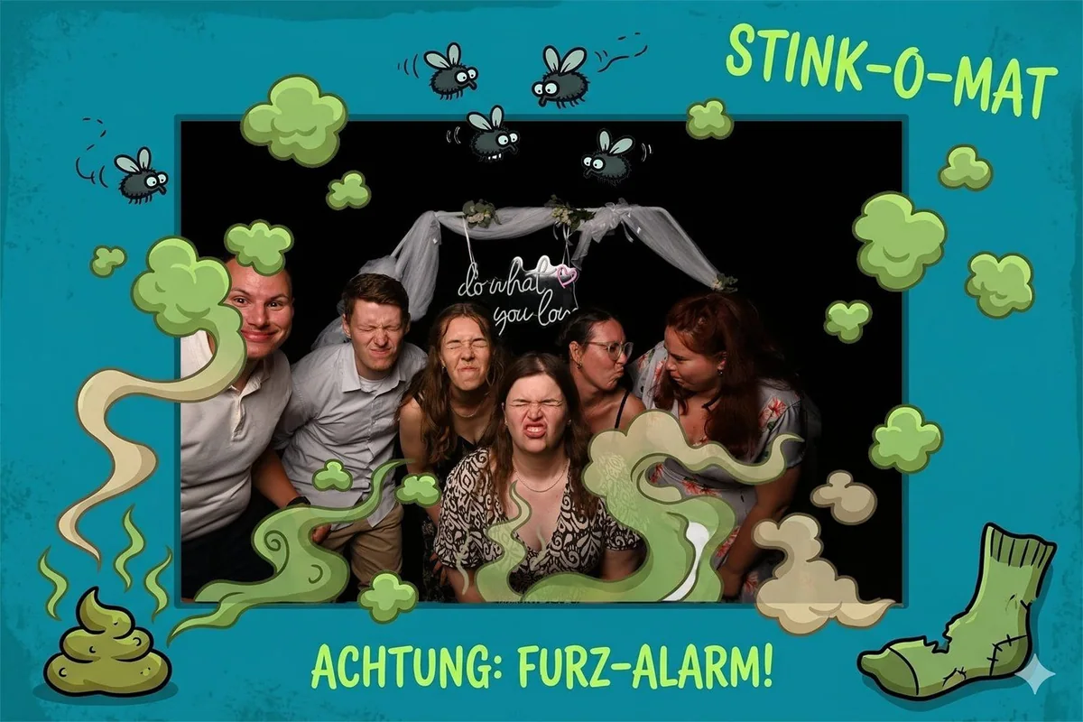 Guests pull faces in the Stink-o-mat frame.