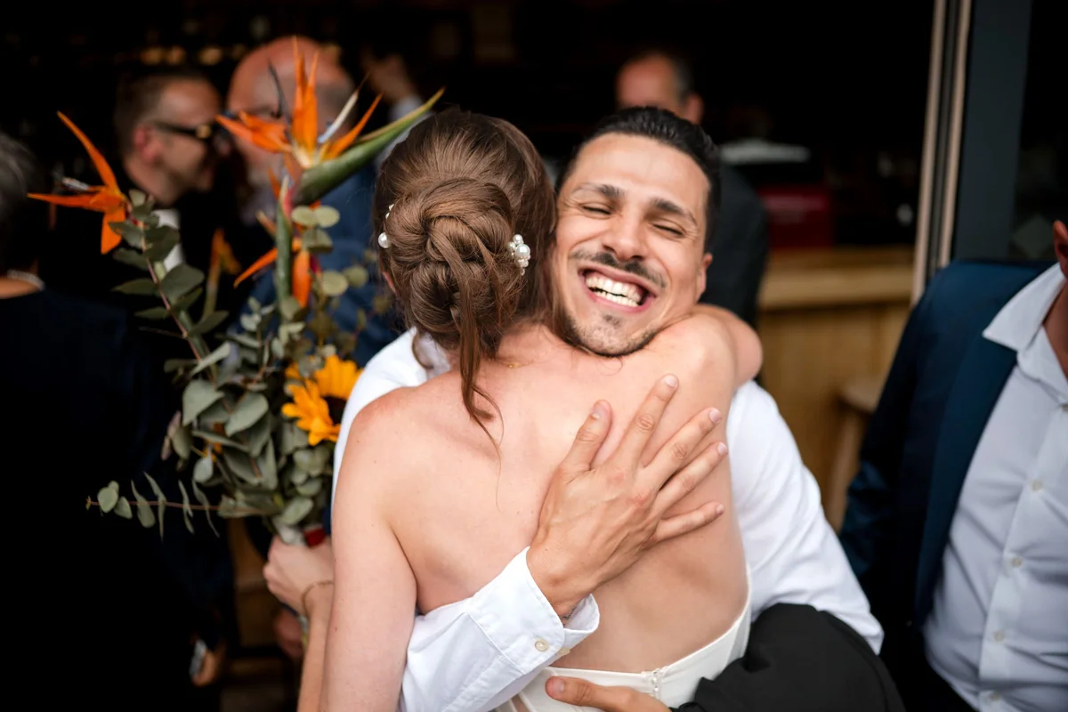 Brianna hugs a guest.