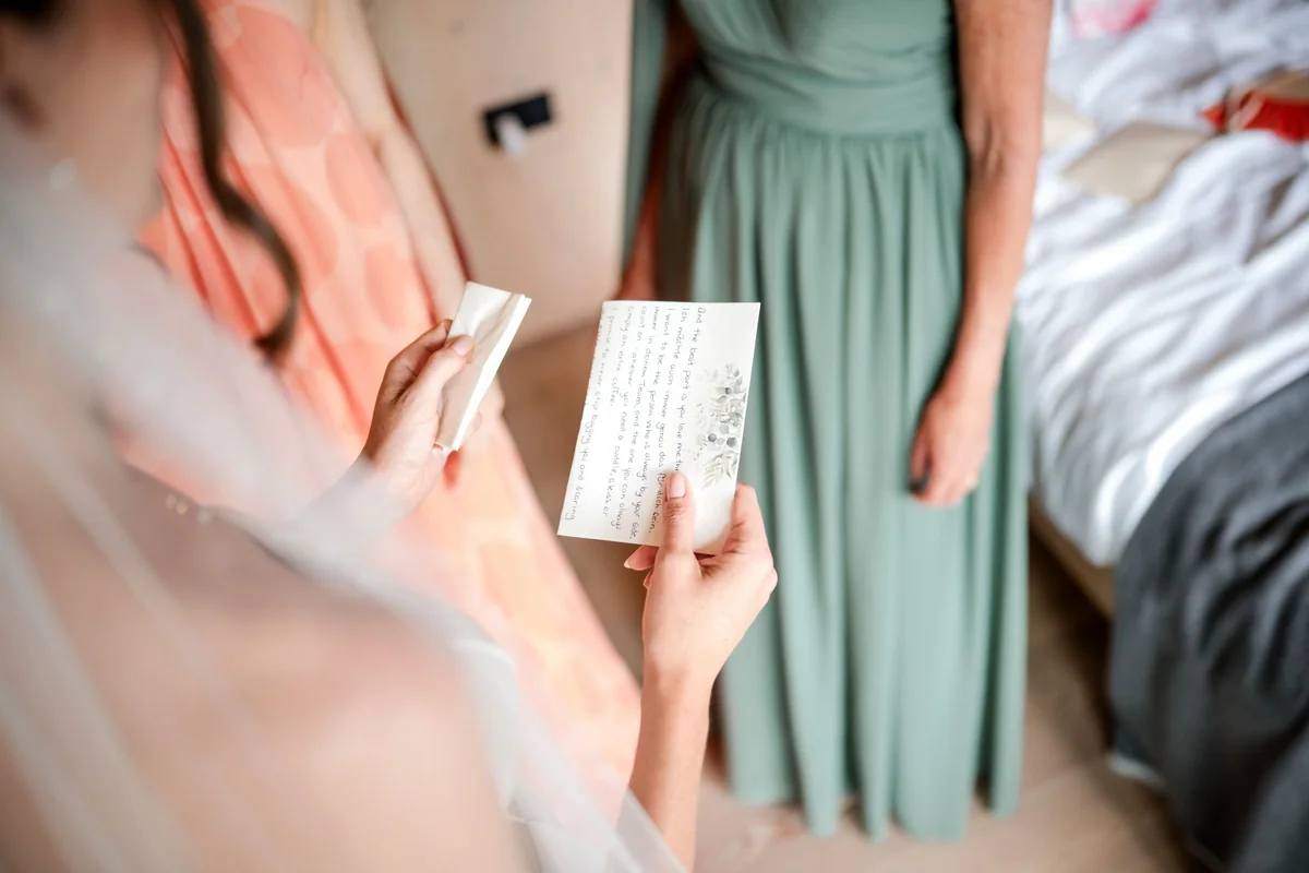 Brianna and her companions look at a message together.